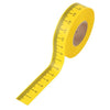 Yellow adhesive-backed bench measuring tape used by CONNTEX for precision cutting and sizing of bespoke hook and loop straps.